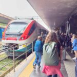 Celine Brewer, owner of 55StillAlive.com, walks to her train at the Roma Termini.